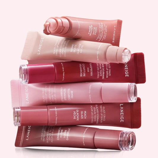 MAIRA'S COLLECTIONS Donut Lip Oil with strawberry, raspberry, and chocolate scent, featuring a cute donut-shaped container and glossy finish