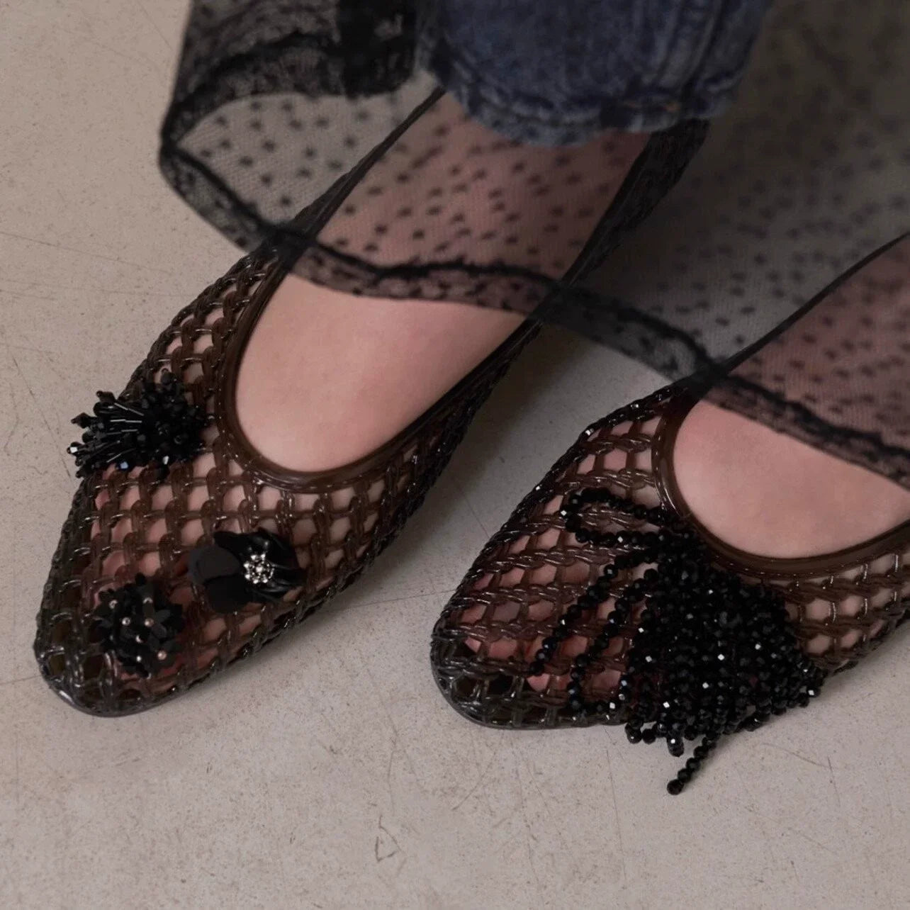 Women's crystal jelly flats with pointed toes, summer sandals by MAIRA'S COLLECTIONS featuring transparent, glossy material and elegant design.