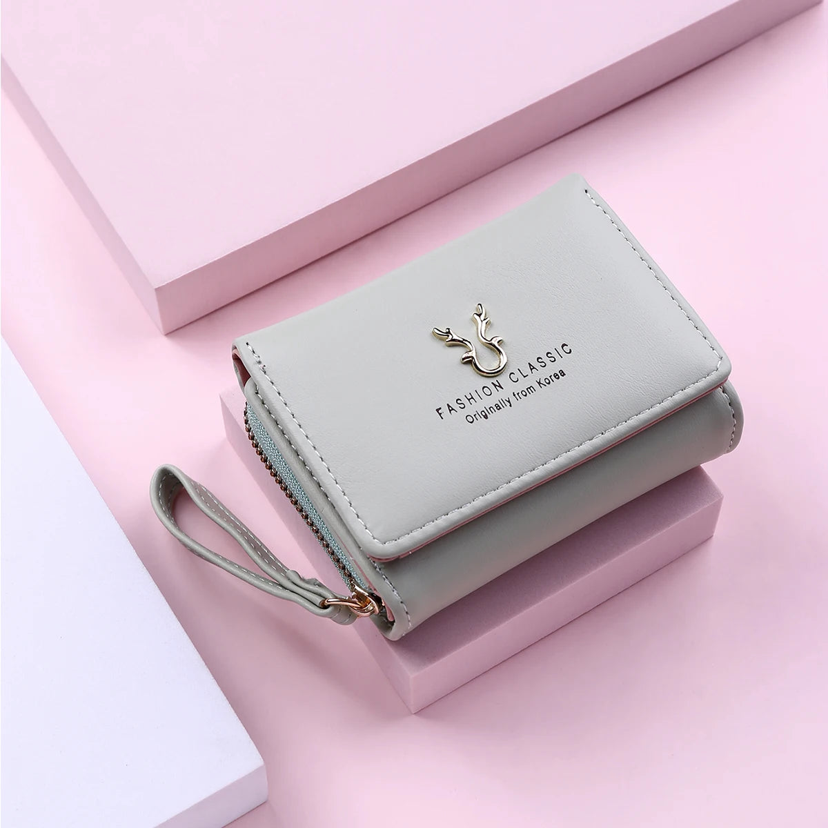 Women's PU leather mini wallet by MAIRA'S COLLECTIONS featuring compact design and card slots in black color.