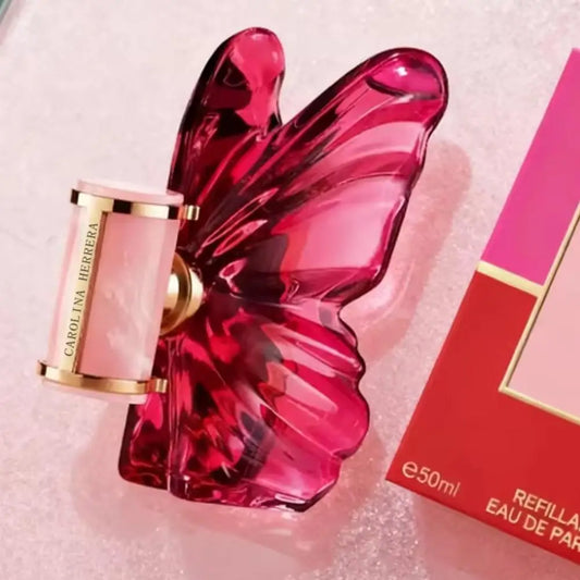Arabian Butterfly Perfume bottle from MAIRA'S COLLECTIONS, elegant glass container with intricate butterfly design and floral accents.