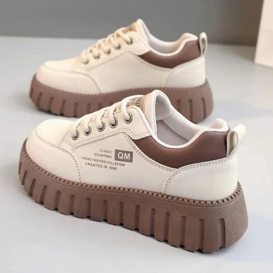 Women's white platform sneakers with thick soles from MAIRA'S COLLECTIONS, showcasing casual style and trendy shoe design.