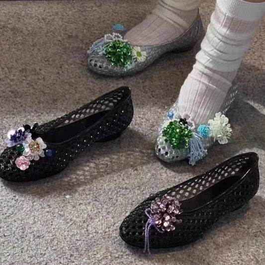 Women's crystal jelly flats by MAIRA'S COLLECTIONS featuring pointed toe summer sandals with transparent, glossy finish.