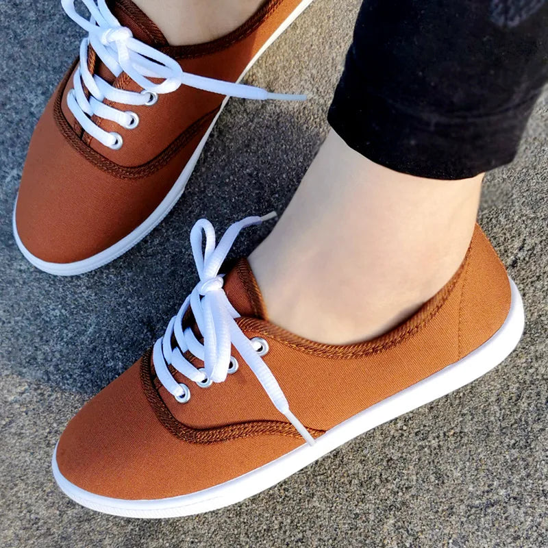 Women's breathable lace-up canvas sneakers with platform soles in size 42, from MAIRA'S COLLECTIONS.