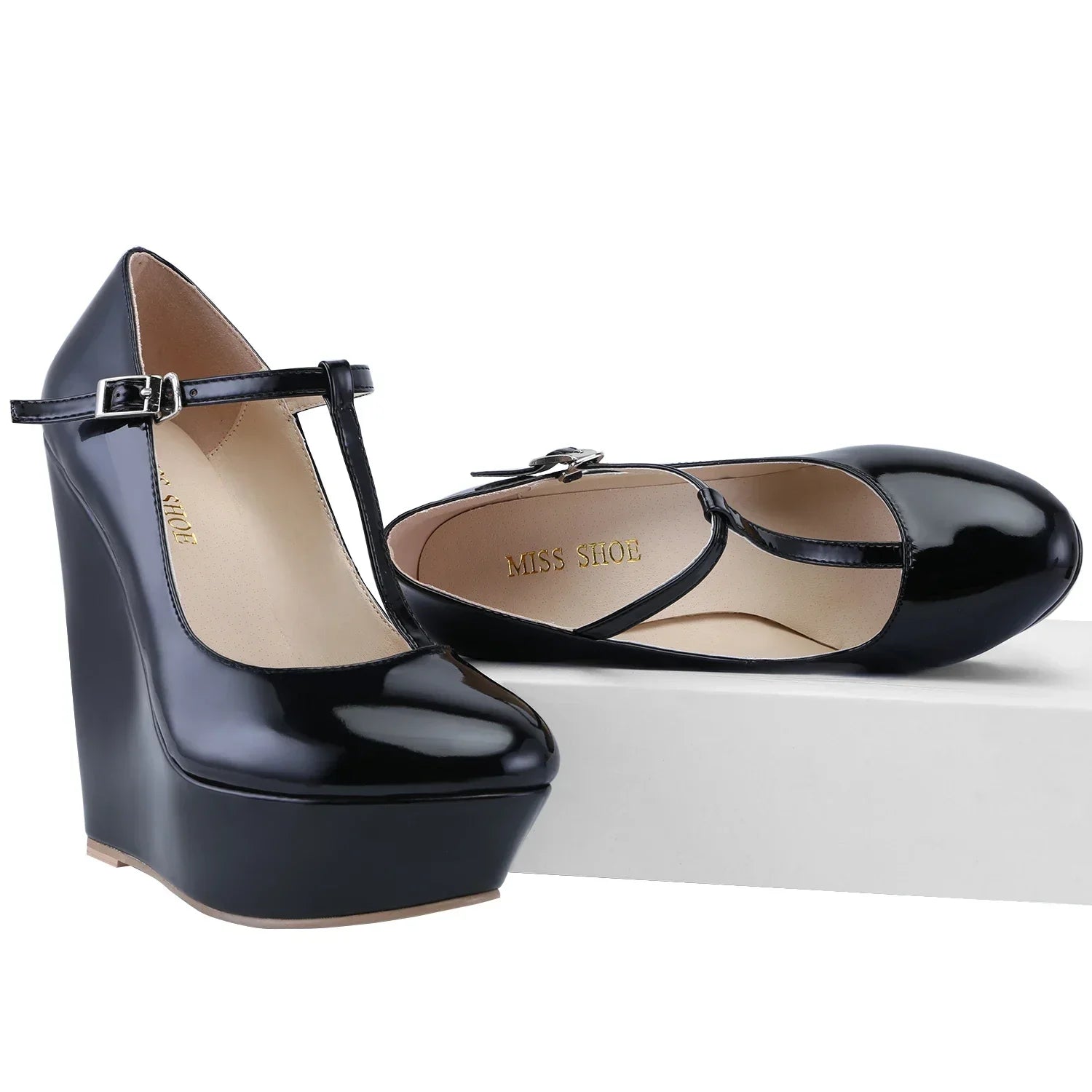 Women's platform wedge pumps by MAIRA'S COLLECTIONS with 14cm high heels and T-strap design, perfect for parties.