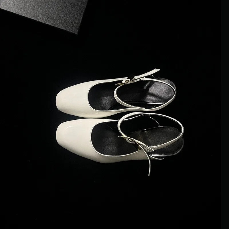 Women's cross strap high heel sandals with irregular heel design by MAIRA'S COLLECTIONS, showcasing stylish footwear with a modern twist.