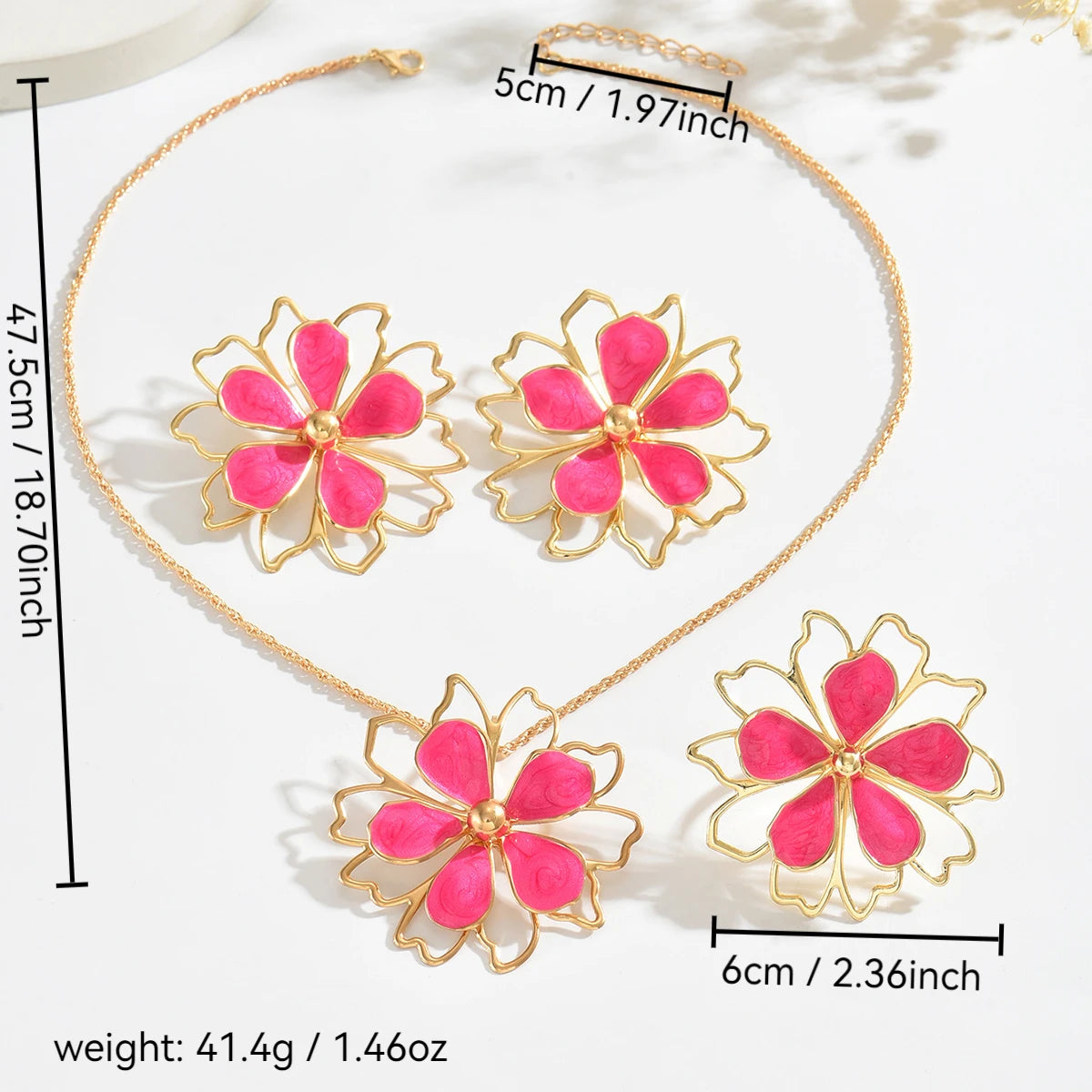 Bohemian floral jewelry set with earrings and necklace from MAIRA'S COLLECTIONS, featuring colorful floral design and intricate details.