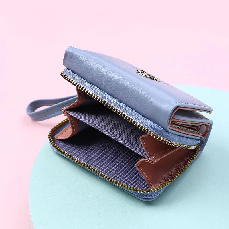 Women's black PU leather mini wallet by MAIRA'S COLLECTIONS with card slots and compact design.