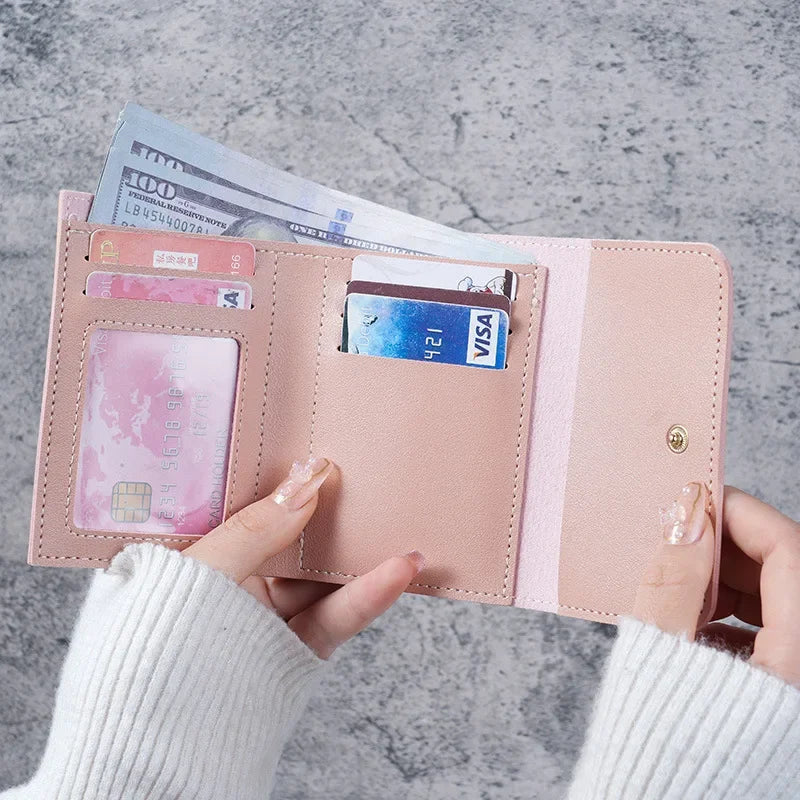 Women's small PU leather wallet from MAIRA'S COLLECTIONS with multiple card slots and a sleek, compact design.