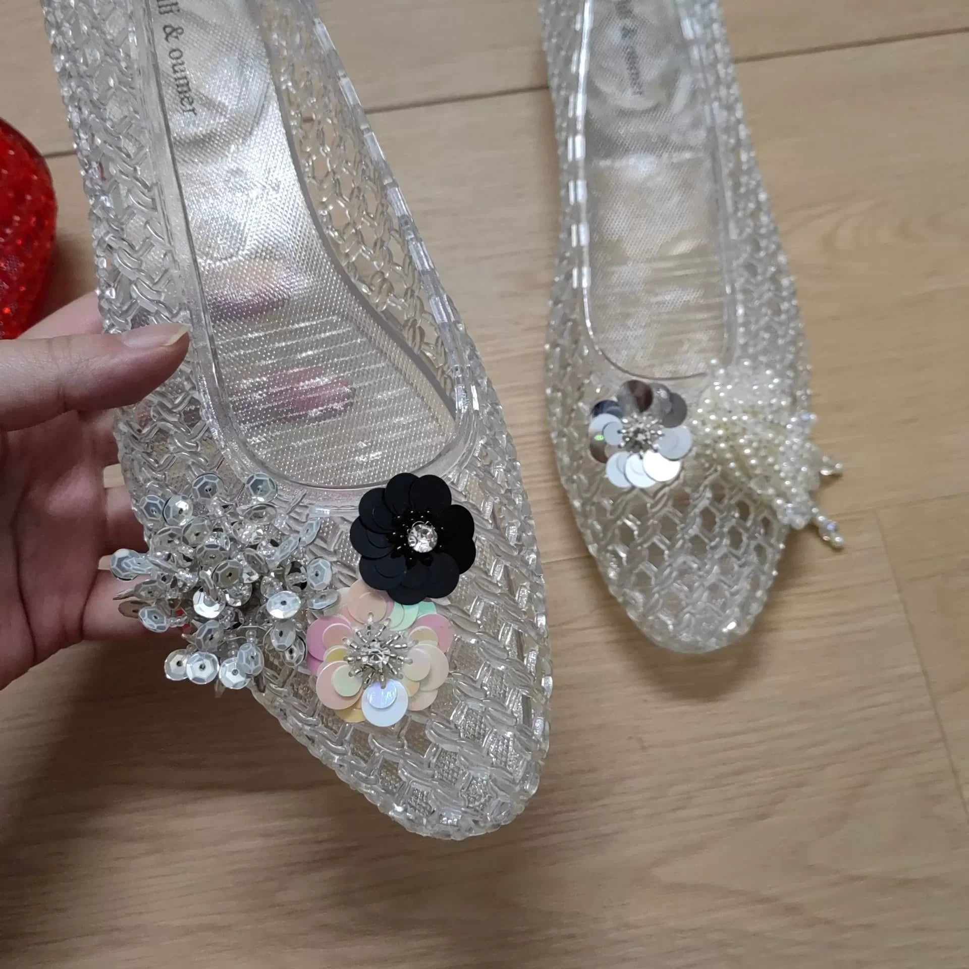 Women's crystal jelly flats by MAIRA'S COLLECTIONS featuring pointed toe summer sandals with transparent, colorful jelly material.