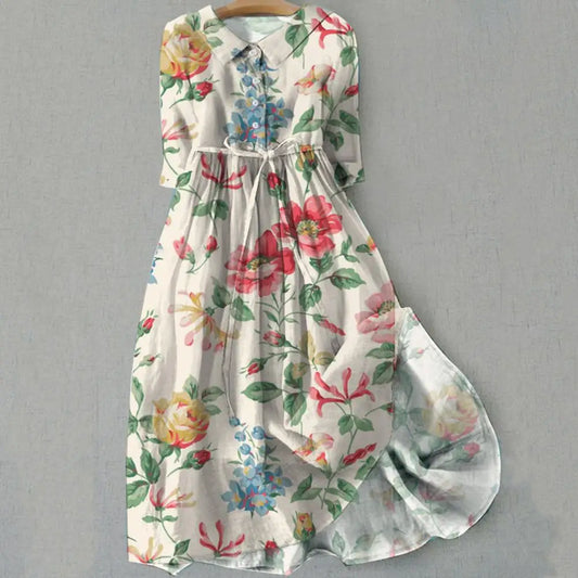 Bohemian floral A-line midi dress by MAIRA'S COLLECTIONS featuring vibrant patterns and flowing fabric.