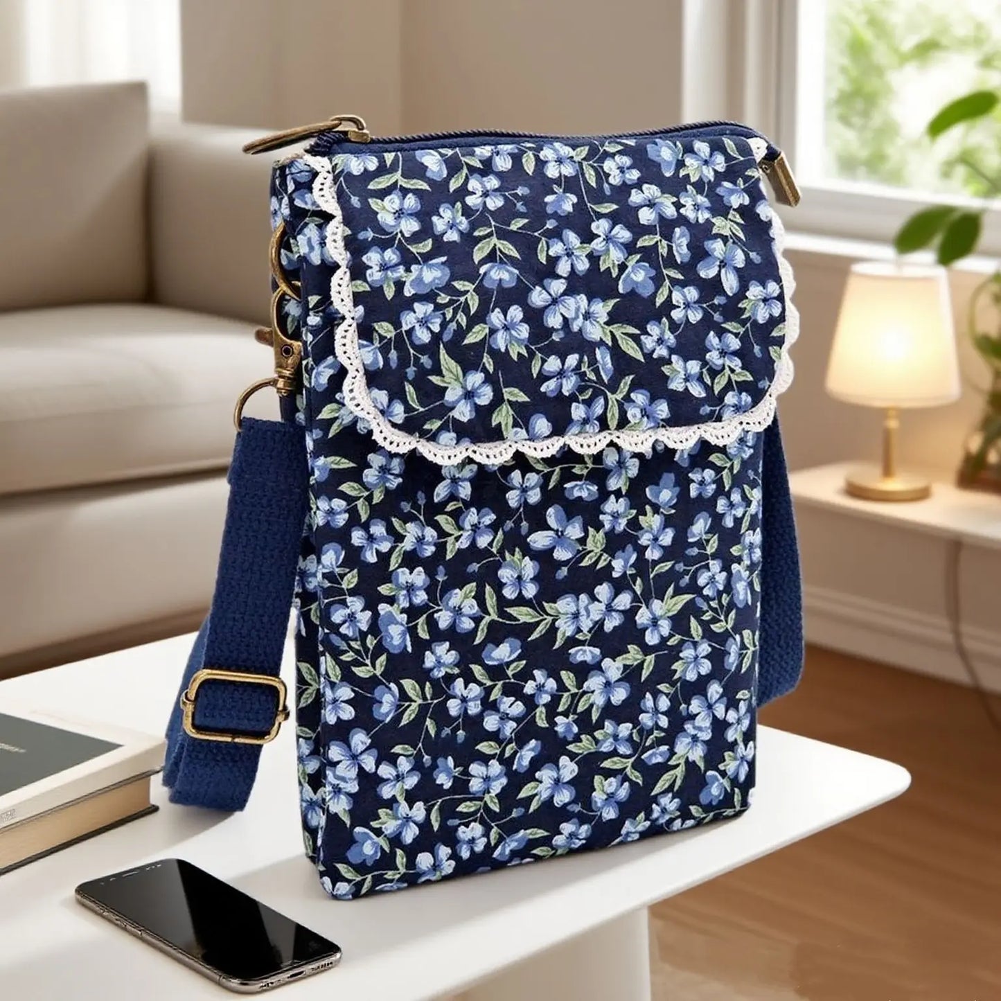Women's printed crossbody phone bag by MAIRA'S COLLECTIONS, featuring a stylish design and adjustable strap for everyday use.