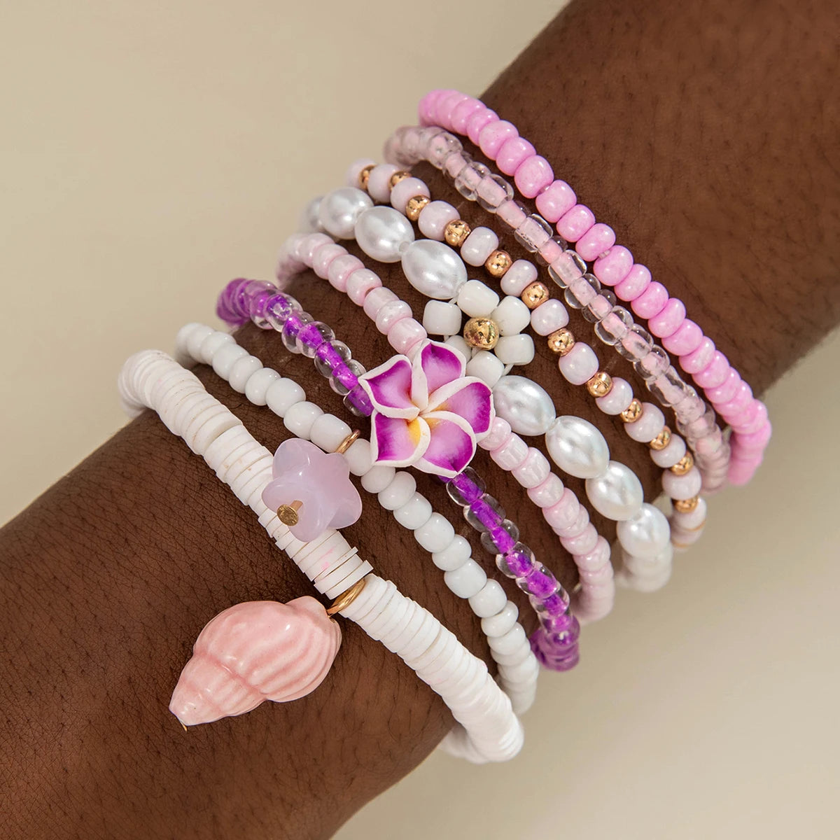 Tocona Bohemian Pearl Bracelet Set with five colorful beaded bracelets from MAIRA'S COLLECTIONS, featuring pearl accents and vibrant designs.