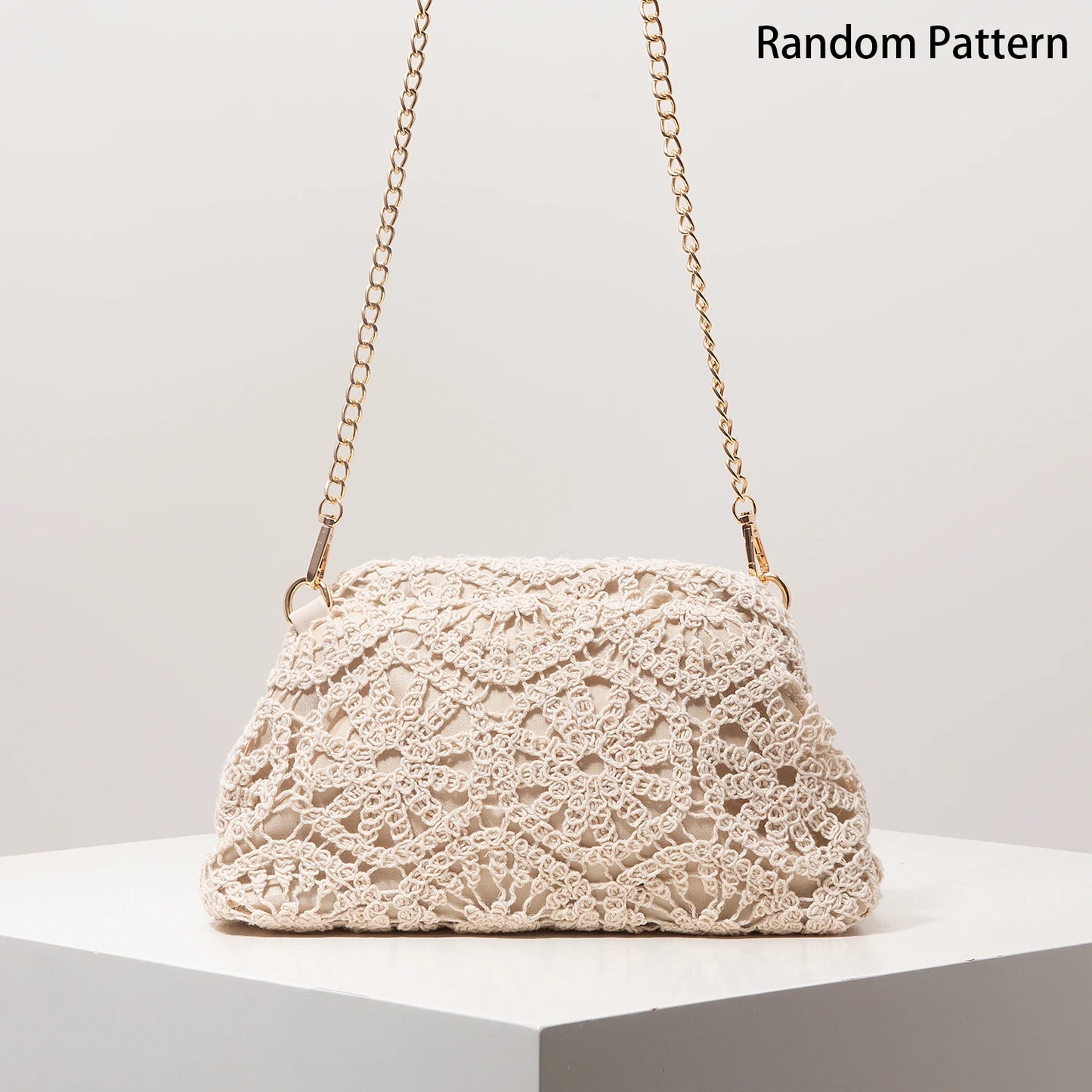 Boho summer crossbody bag by MAIRA'S COLLECTIONS featuring woven design and adjustable strap on beige fabric background.