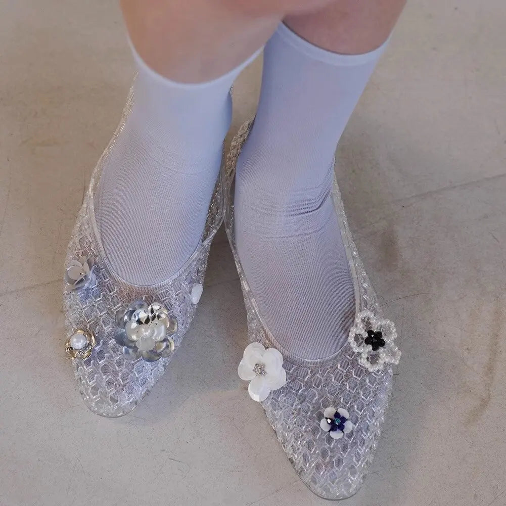 Women's crystal jelly flats with pointed toe from MAIRA'S COLLECTIONS, summer sandals featuring transparent, glossy design.