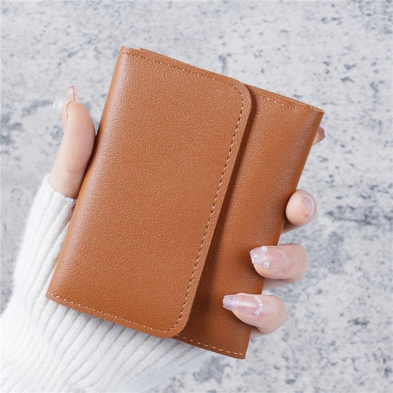 Women's small PU leather wallet by MAIRA'S COLLECTIONS featuring multiple card slots and a sleek design.