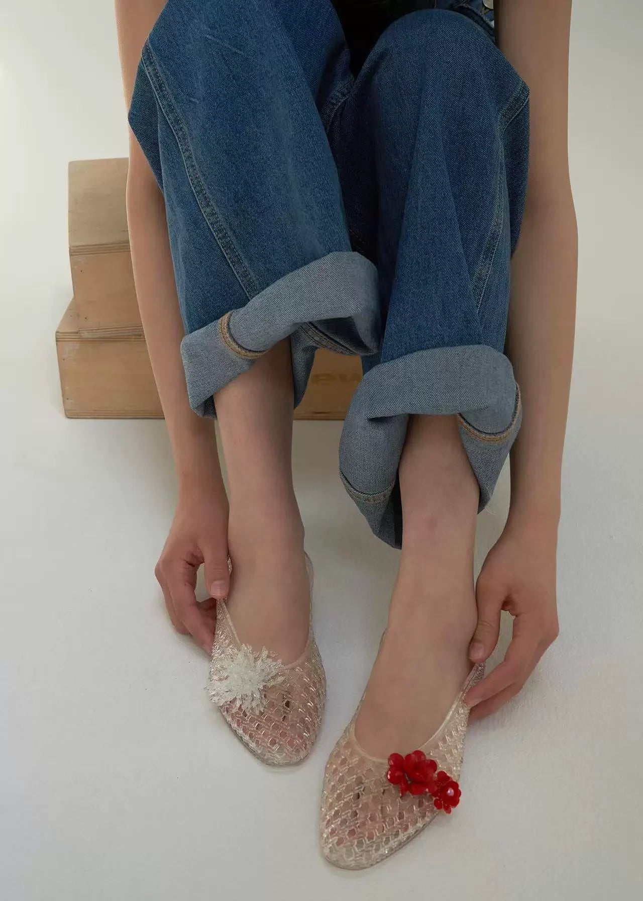 Women's crystal jelly flats by MAIRA'S COLLECTIONS featuring pointed toe summer sandals with transparent, glossy design.