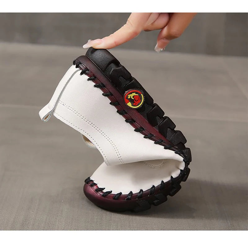Women's leather sneakers by MAIRA'S COLLECTIONS featuring lace-up design and casual comfort shoes on a white background.