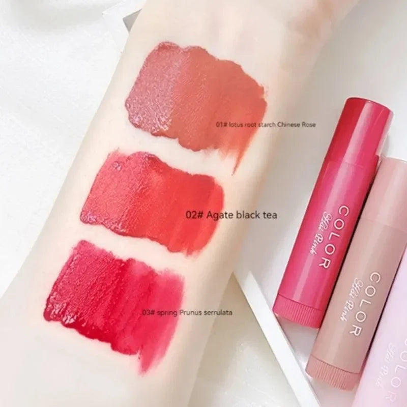 MAIRA'S COLLECTIONS moisturizing lip balm and lip glaze in a sleek tube, highlighting smooth, shiny finish on lips.