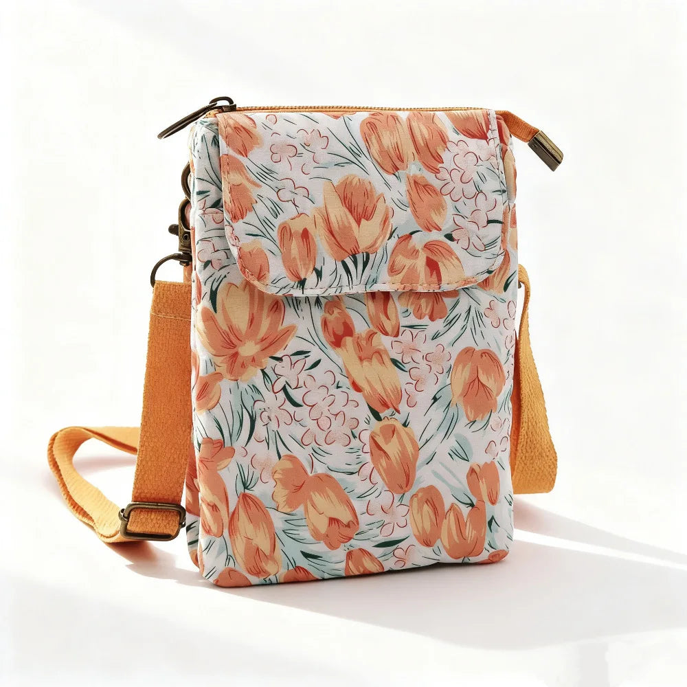 Women's printed crossbody phone bag by MAIRA'S COLLECTIONS with colorful floral pattern and adjustable strap.