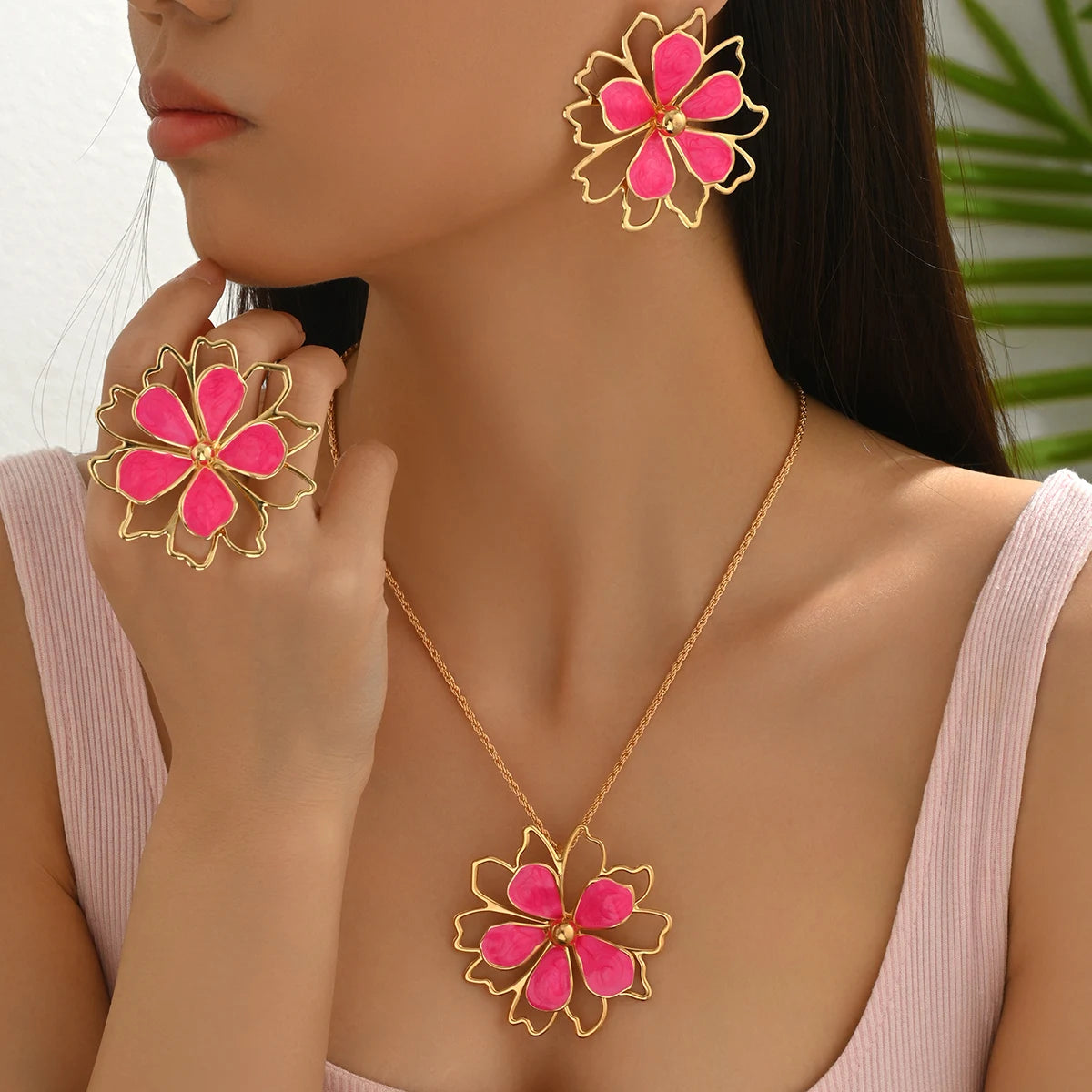 Bohemian floral jewelry set with earrings and necklace from MAIRA'S COLLECTIONS, featuring colorful floral designs and intricate detailing.