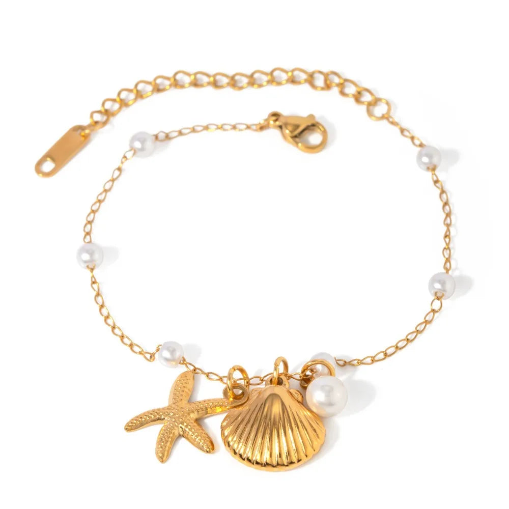 Bohemian starfish shell pearl bracelet from MAIRA'S COLLECTIONS featuring starfish charms and pearl beads in a stylish design.