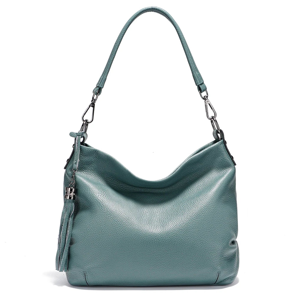 Zency cowhide leather shoulder bag by MAIRA'S COLLECTIONS featuring smooth brown leather and adjustable strap.