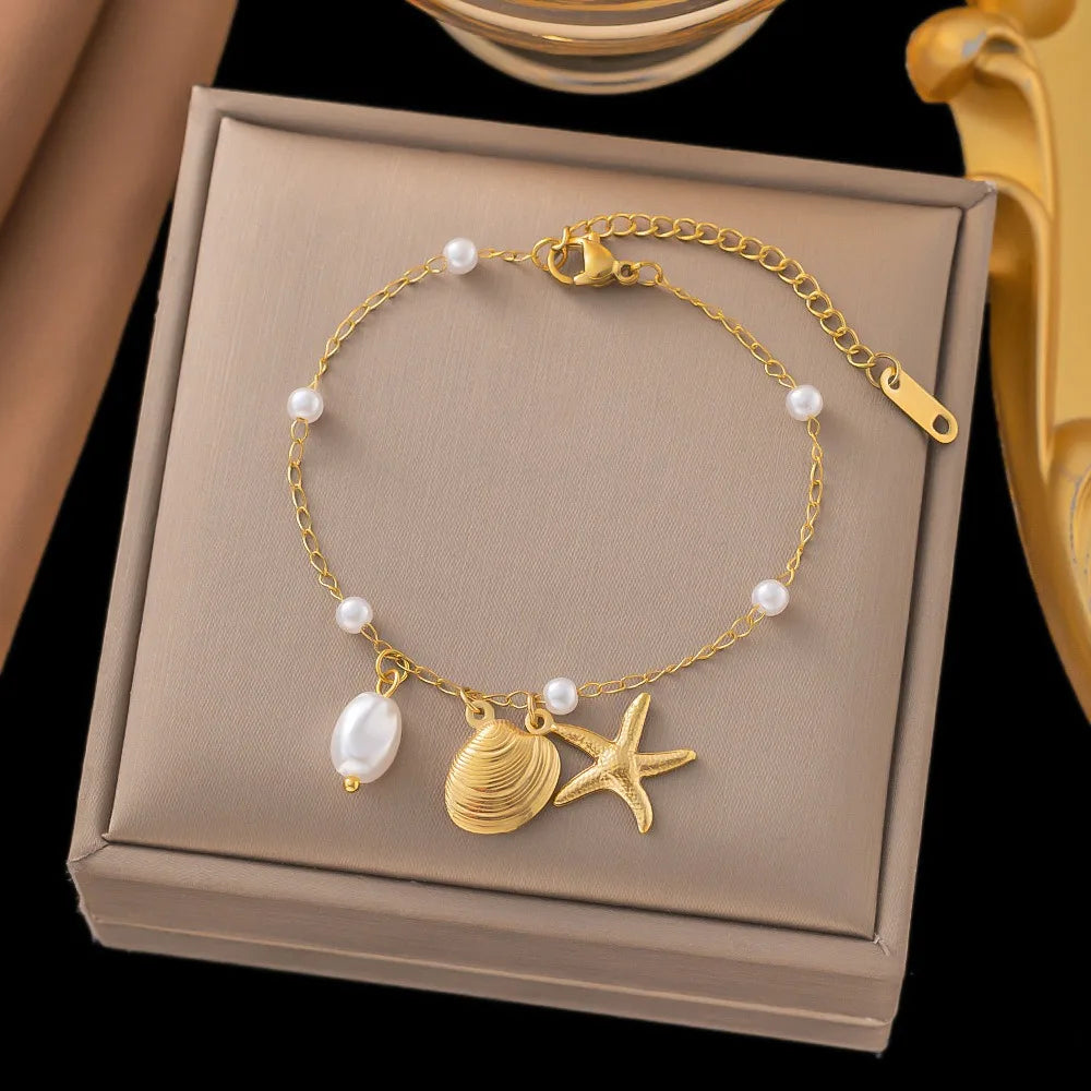 Bohemian starfish shell pearl bracelet with beads and charm, featuring a stylish design from MAIRA'S COLLECTIONS.