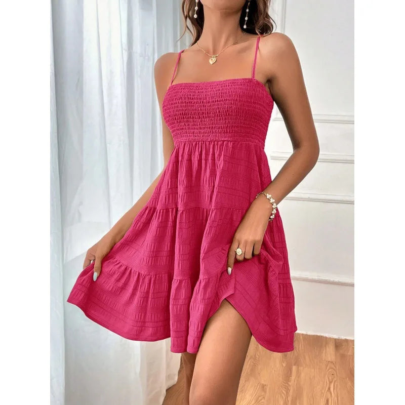 Women's smocked mini dress by MAIRA'S COLLECTIONS featuring a fitted bodice and flowy skirt, perfect for casual and summer wear.