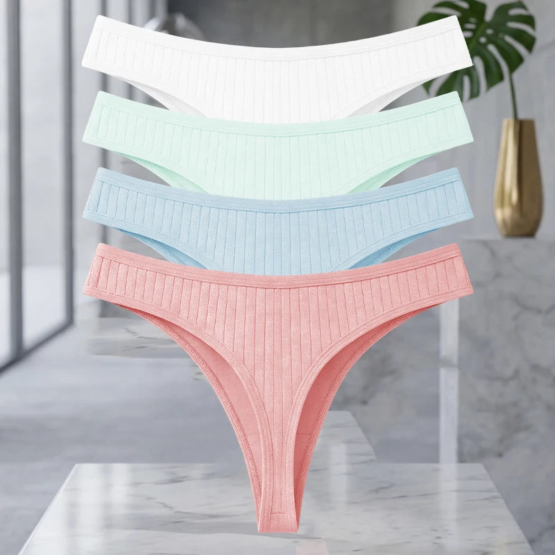 Set of four MAIRA'S COLLECTIONS cotton ribbed seamless women's thongs in solid colors, featuring comfortable, lightweight design.