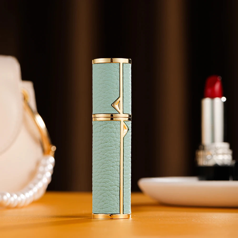 MAIRA'S COLLECTIONS Louischanzl 5ml refillable perfume atomizer spray bottle for travel, sleek and compact design visible.