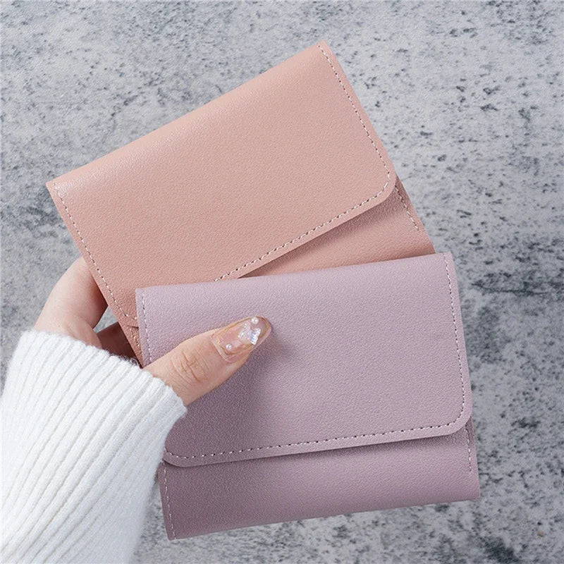 Women's small PU leather wallet by MAIRA'S COLLECTIONS featuring multiple card slots and a sleek, compact design.