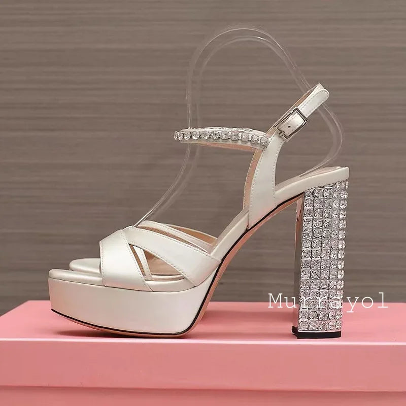 Women's satin platform high heel sandals with rhinestone embellishments, perfect for parties and special occasions.