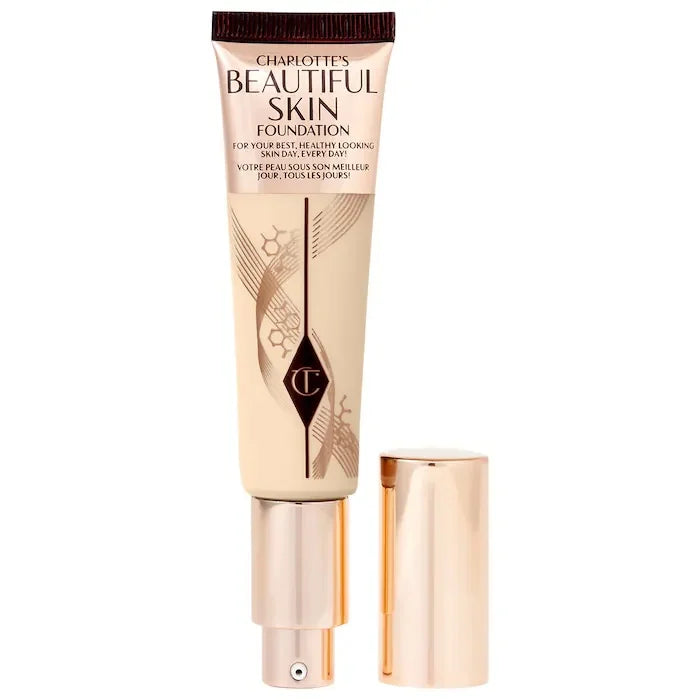 MAIRA'S COLLECTIONS CT Starlight Liquid Flawless Glow Primer in a sleek bottle with a shimmering, luminous finish for radiant skin.