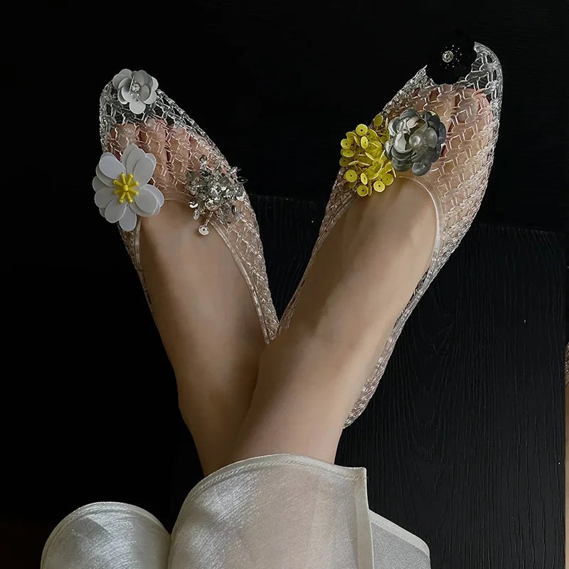 Women's crystal jelly flats with pointed toes, summer sandals from MAIRA'S COLLECTIONS featuring transparent, glossy material.