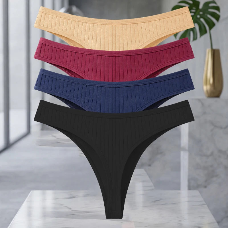 Set of four MAIRA'S COLLECTIONS cotton ribbed seamless women's thongs in solid colors, showing the comfortable, stretchy fabric.