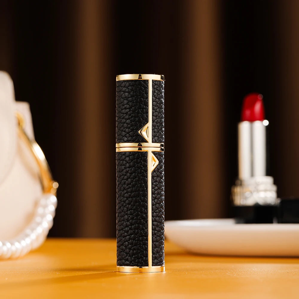 MAIRA'S COLLECTIONS Louischanzl refillable perfume atomizer bottle, 5ml travel spray with sleek design and transparent body.