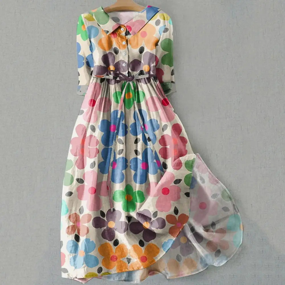 Bohemian floral A-line midi dress by MAIRA'S COLLECTIONS with colorful, flowing fabric and a flattering silhouette.