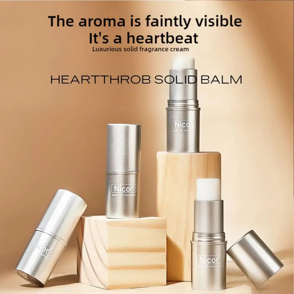Long-lasting love solid perfume balm stick for women with elegant packaging from MAIRA'S COLLECTIONS, featuring a sleek, compact design.