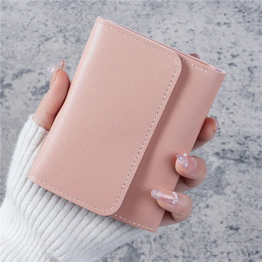 Small women's PU leather wallet by MAIRA'S COLLECTIONS featuring multiple card slots and a sleek, compact design.