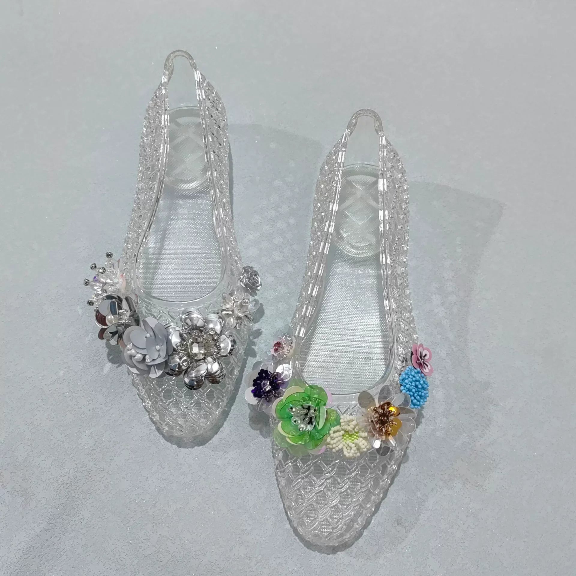 Women's Crystal Jelly Flats by MAIRA'S COLLECTIONS featuring pointed toe summer sandals with clear jelly material and decorative crystals.