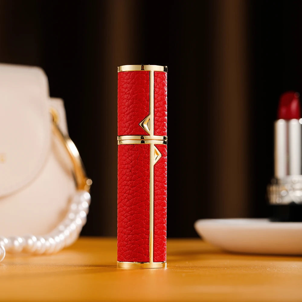 MAIRA'S COLLECTIONS Louischanzl refillable perfume atomizer bottle, 5ml travel spray with silver cap and transparent glass body.
