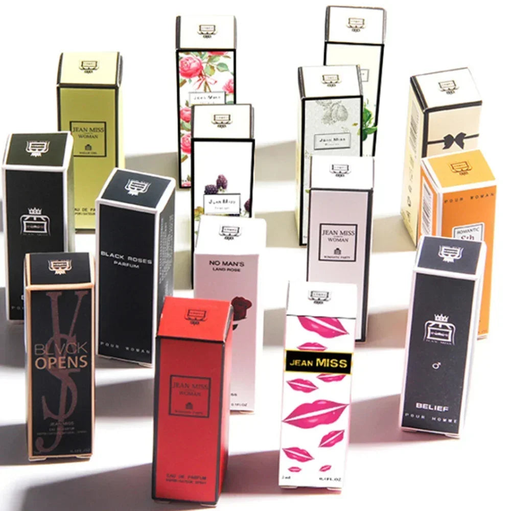 Set of five 3ml Q Style Pheromone Perfume bottles from MAIRA'S COLLECTIONS displayed in clear containers.