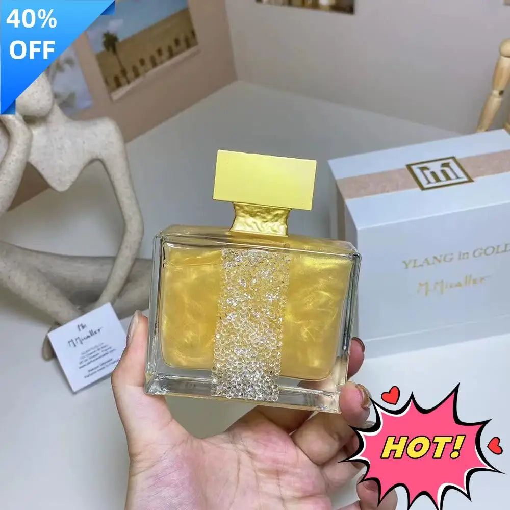 Royal Muscat Gold perfume bottle by MAIRA'S COLLECTIONS with elegant gold and white design, 100ml size.