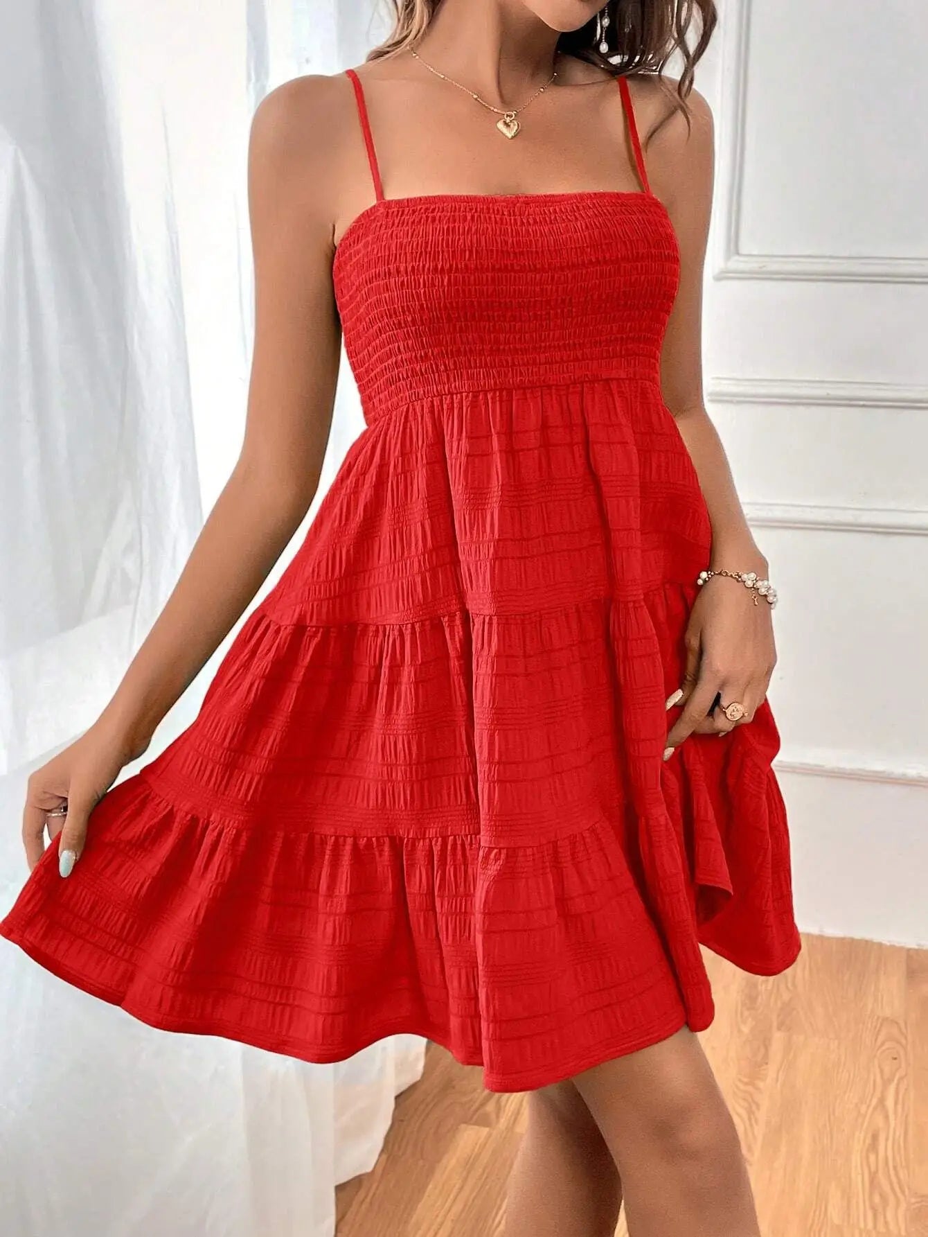 Women's smocked mini dress by MAIRA'S COLLECTIONS featuring a fitted bodice and lightweight fabric, perfect for casual wear.