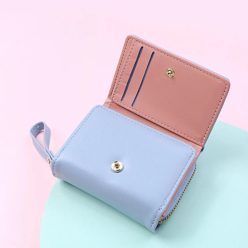 Women's PU leather mini wallet by MAIRA'S COLLECTIONS featuring compact design and multiple card slots.