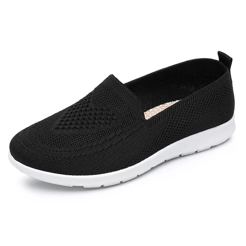 Women's casual walking shoes by MAIRA'S COLLECTIONS with breathable fabric and soft, comfortable design, shown in a stylish profile view.