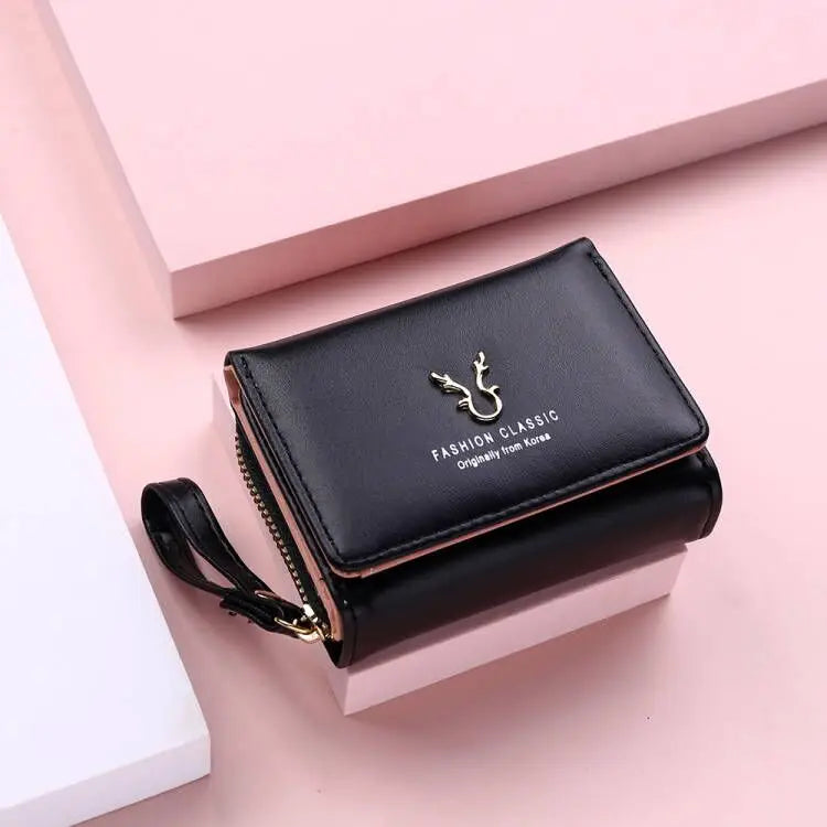 Women's PU leather mini wallet by MAIRA'S COLLECTIONS featuring a sleek, compact design with multiple card slots and secure closure
