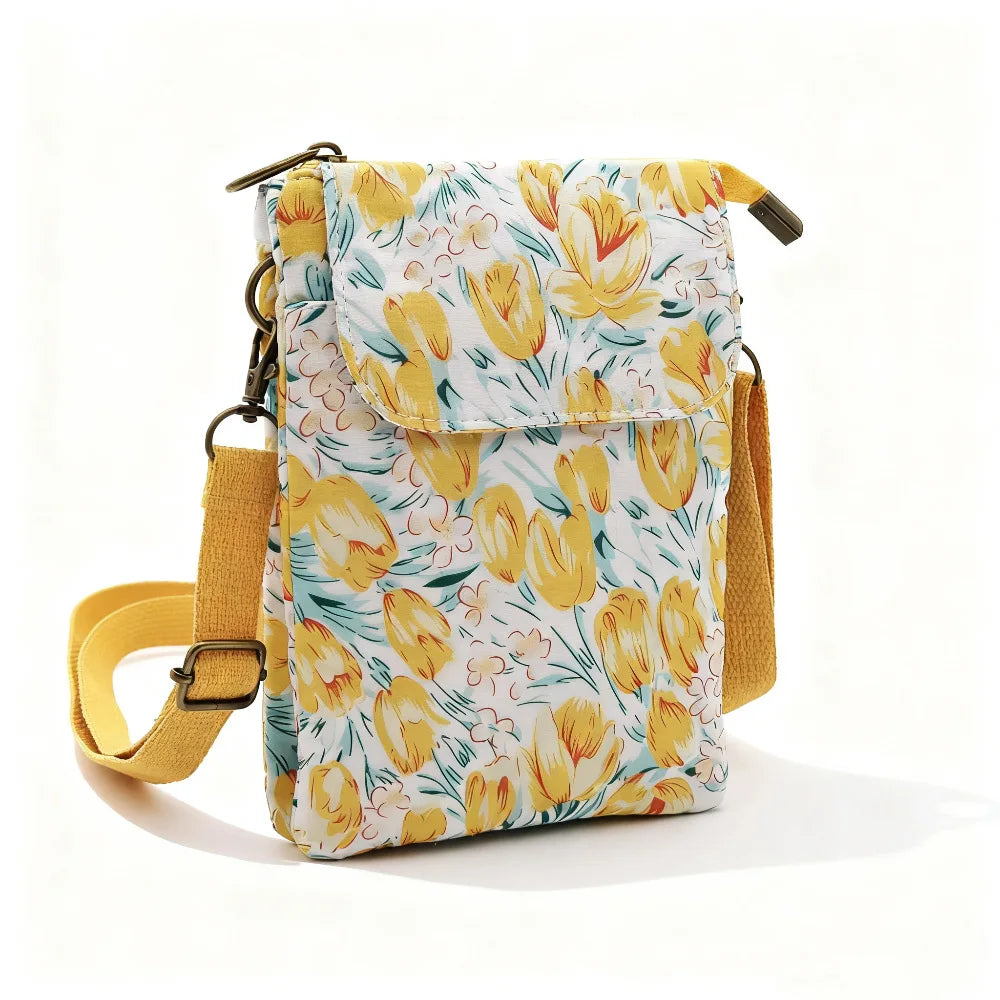 Women's printed crossbody phone bag by MAIRA'S COLLECTIONS featuring a colorful floral pattern and adjustable strap.