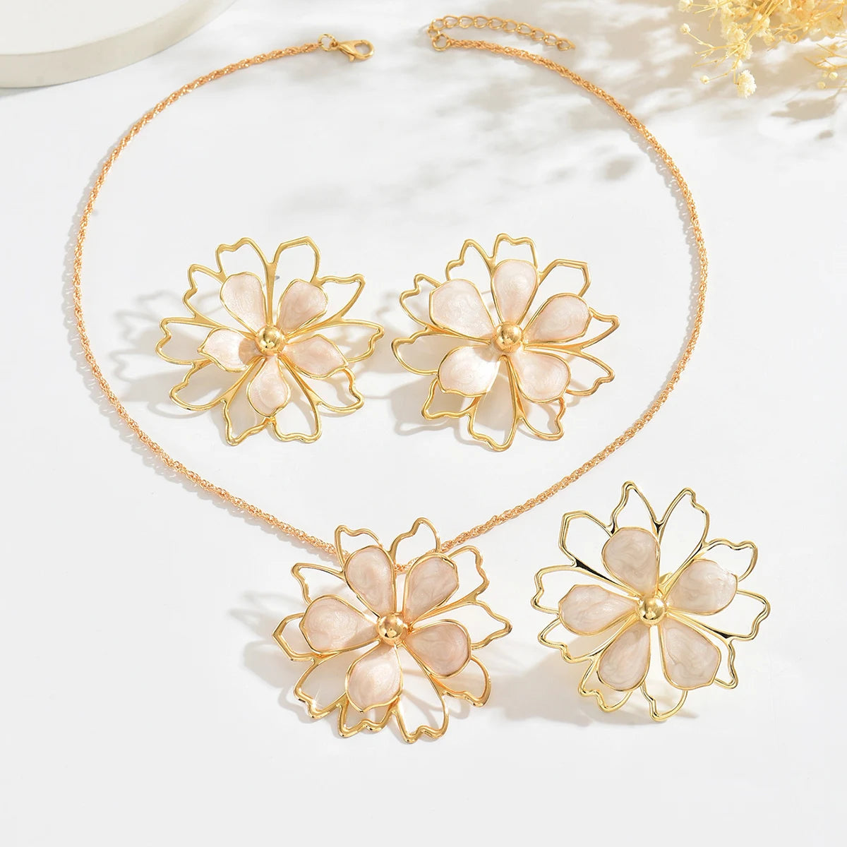 Bohemian floral jewelry set by MAIRA'S COLLECTIONS featuring colorful flower-themed necklaces and earrings.