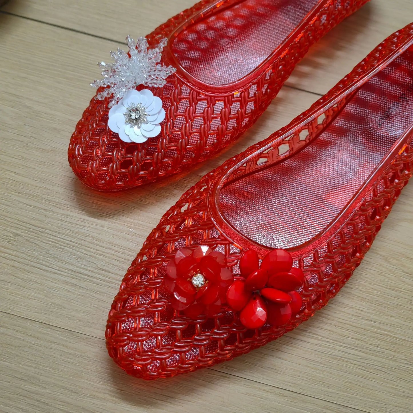 Women's crystal jelly flats by MAIRA'S COLLECTIONS featuring pointed toe summer sandals with transparent, glossy finish and crystal accents.